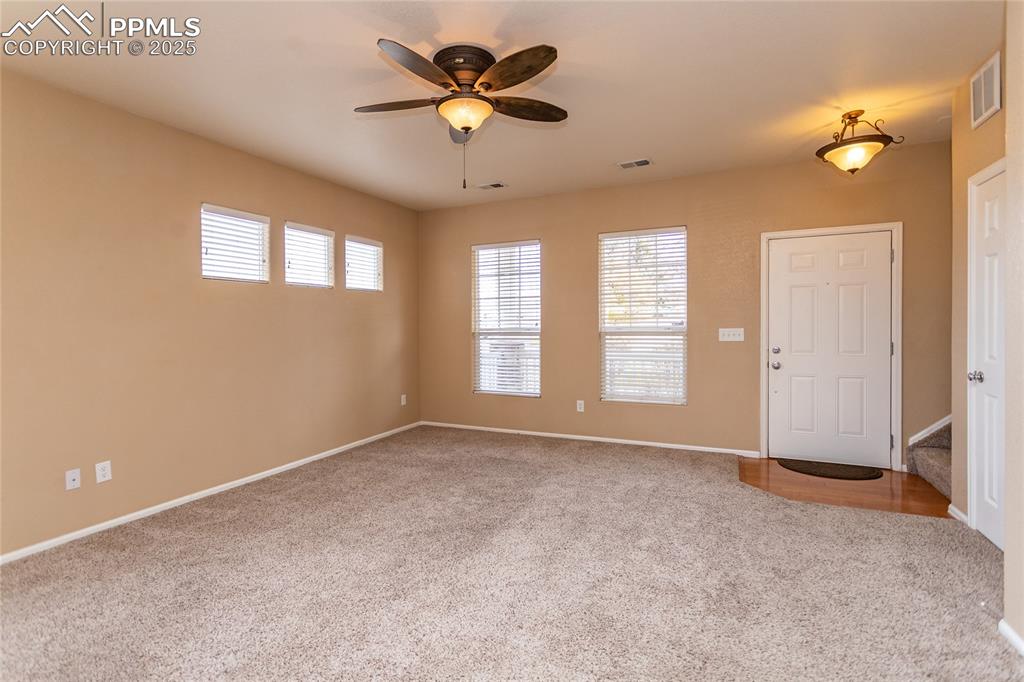 4829 Harrier Ridge Drive Colorado Springs, CO 80916 - Photo 10 of 50 a view of an empty room with a window