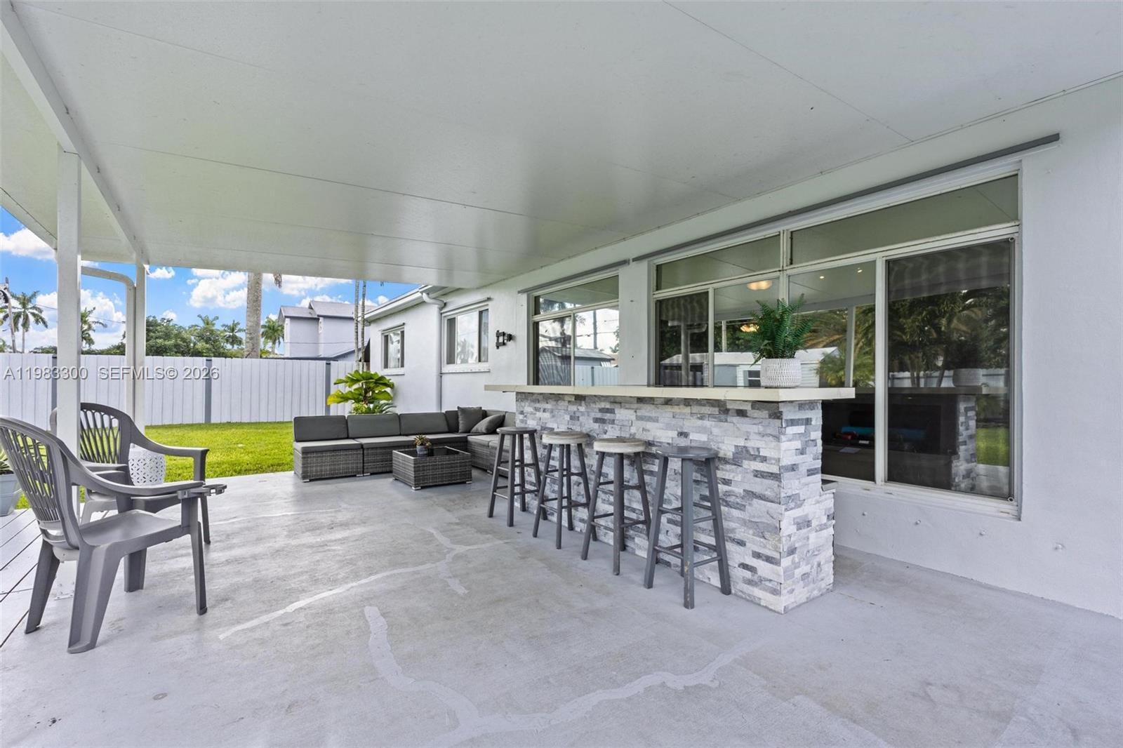 a outdoor space with lots of table and chairs