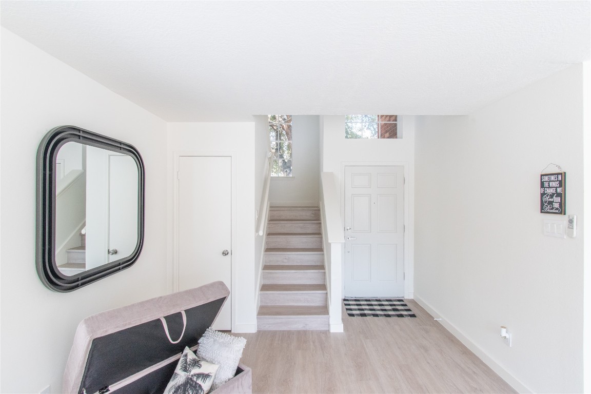 12447 South Rachlin Circle Houston, TX 77071 - Photo 21 of 34 a view of a livingroom with wooden floor and entryway