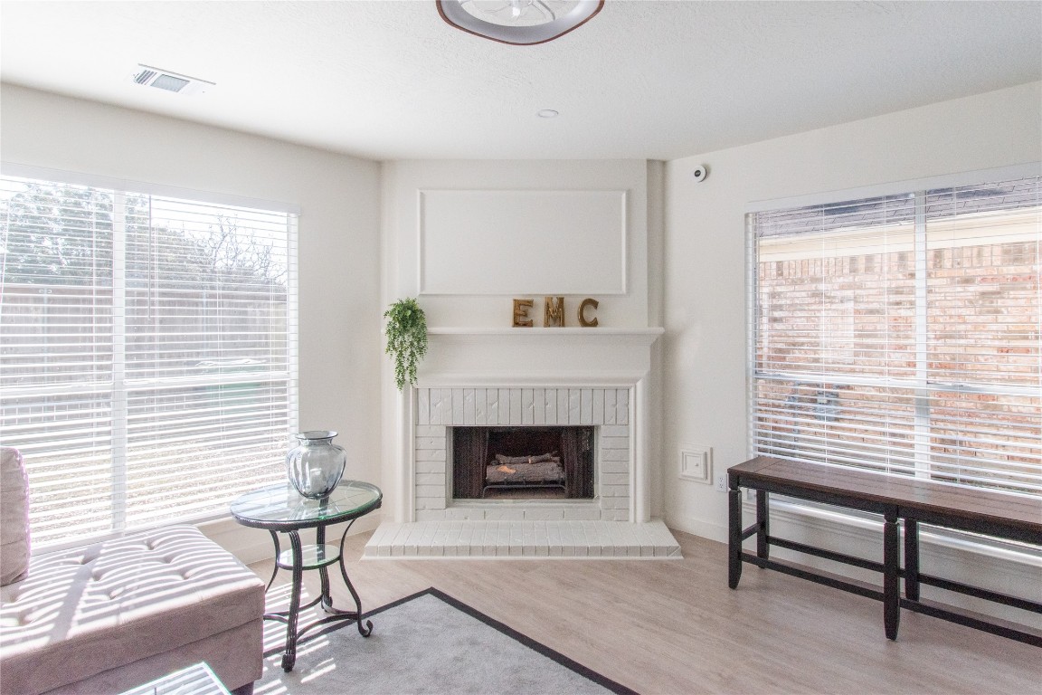 12447 South Rachlin Circle Houston, TX 77071 - Photo 9 of 34 a living room with furniture and a fireplace