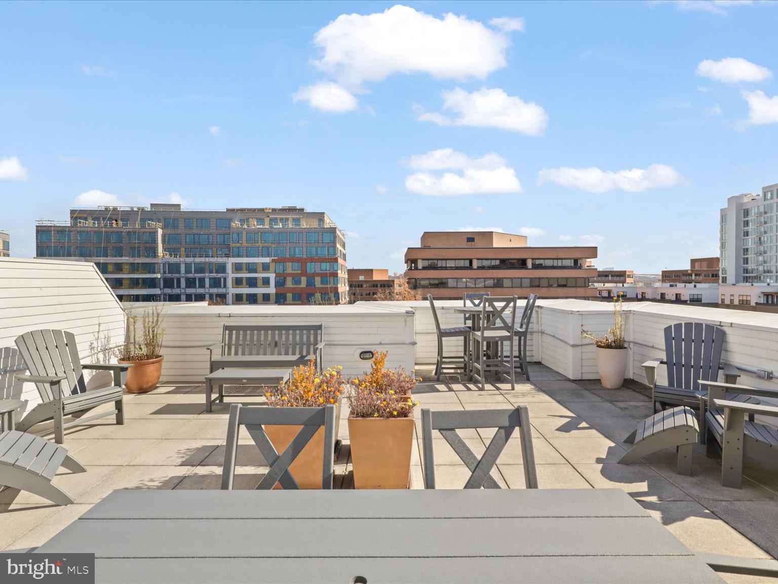 1023 North Royal Street, Unit 214 Alexandria, VA 22314 - Photo 19 of 38 a view of a terrace with chairs