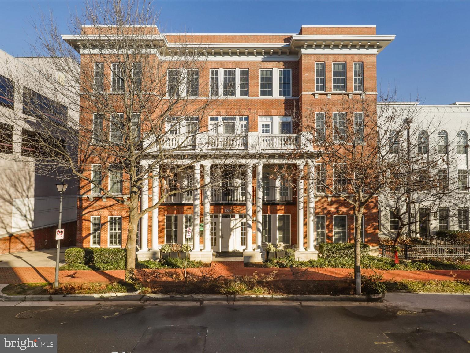 1023 North Royal Street, Unit 214 Alexandria, VA 22314 - Photo 2 of 38 a front view of a building with street view