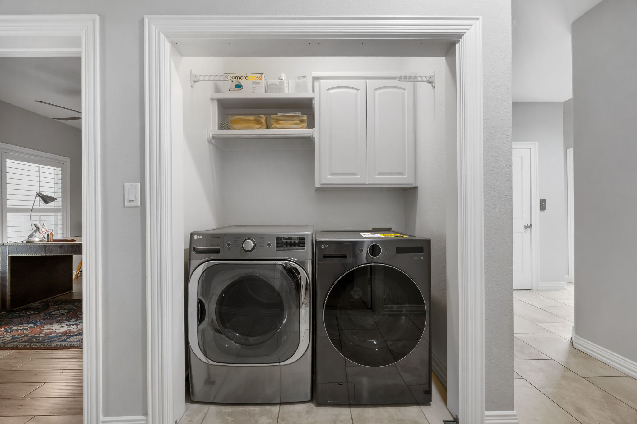 1910 Rue De St Tropez, Unit 6 Austin, TX 78746 - Photo 27 of 37 A dedicated laundry space, designed for seamless home management.