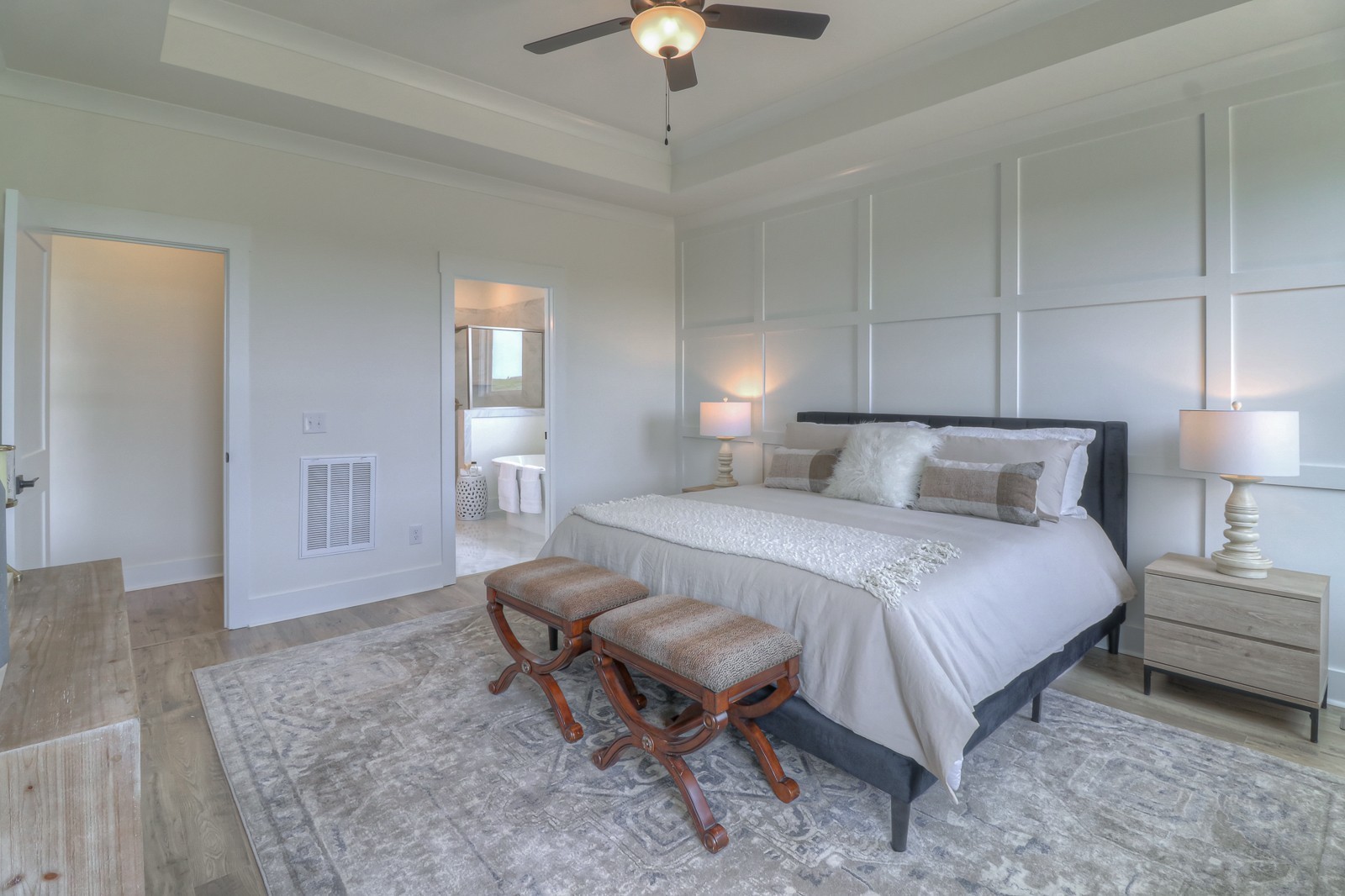 4026 John Marsh Road Spring Hill, TN 37174 - Photo 9 of 31 a spacious bedroom with a bed and a chandelier