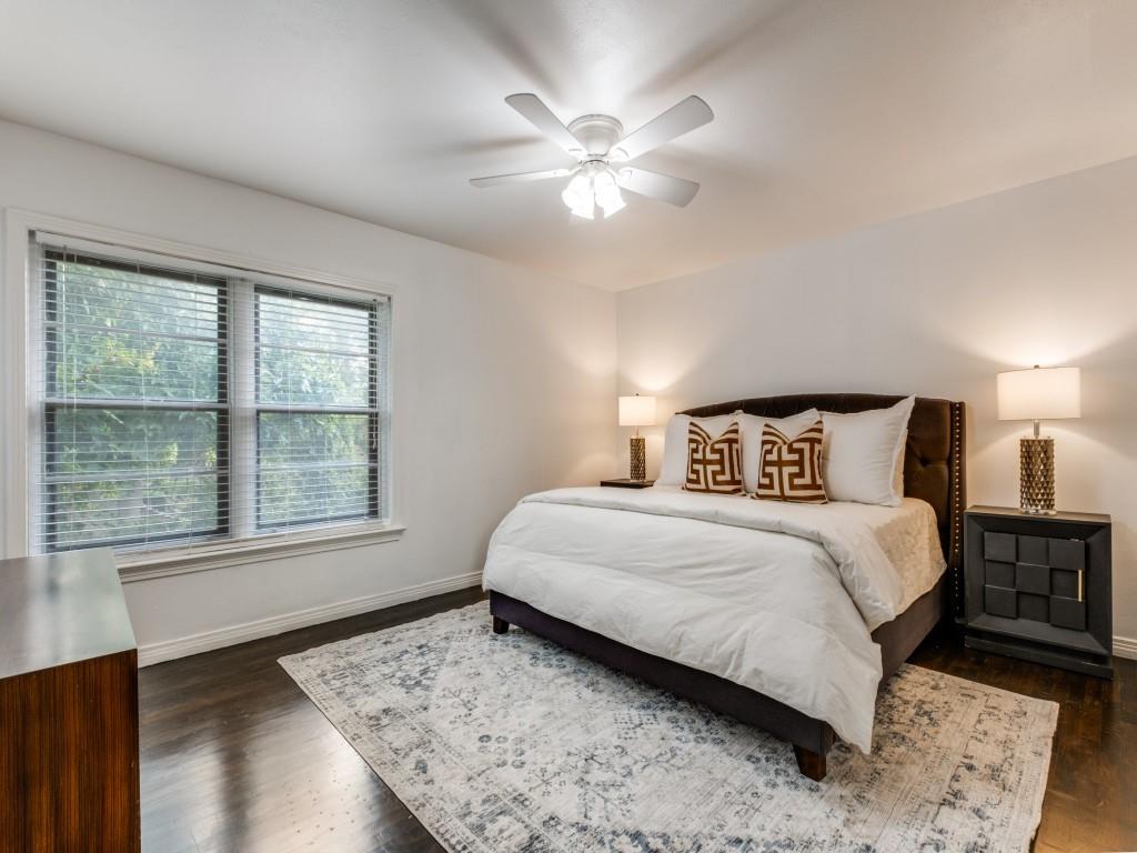 6431 Bordeaux Avenue Dallas, TX 75209 - Photo 11 of 18 a bedroom with a large bed and a window