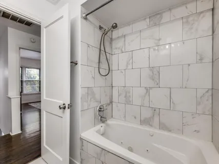 a view of a wooden bench in a balcony