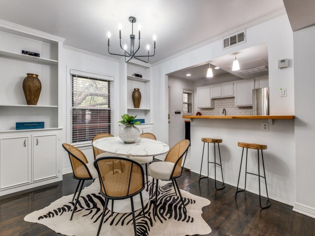 6431 Bordeaux Avenue Dallas, TX 75209 - Photo 5 of 18 a view of a dining room with furniture and chandelier
