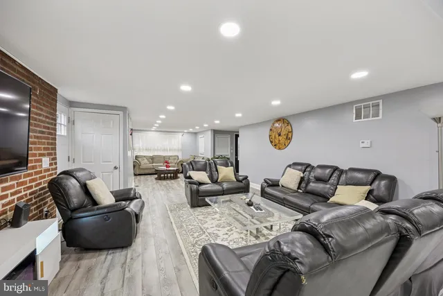 a living room with furniture and a couch