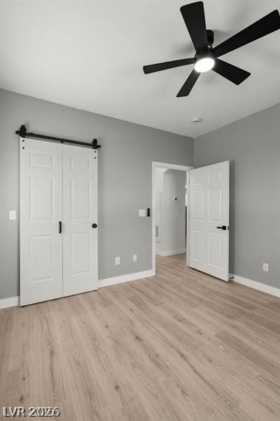 3320 South Fort Apache Road, Unit 125 Las Vegas, NV 89117 - Photo 11 of 26 A quiet retreat with stylish barn doors and light wood flooring for tranquil living.