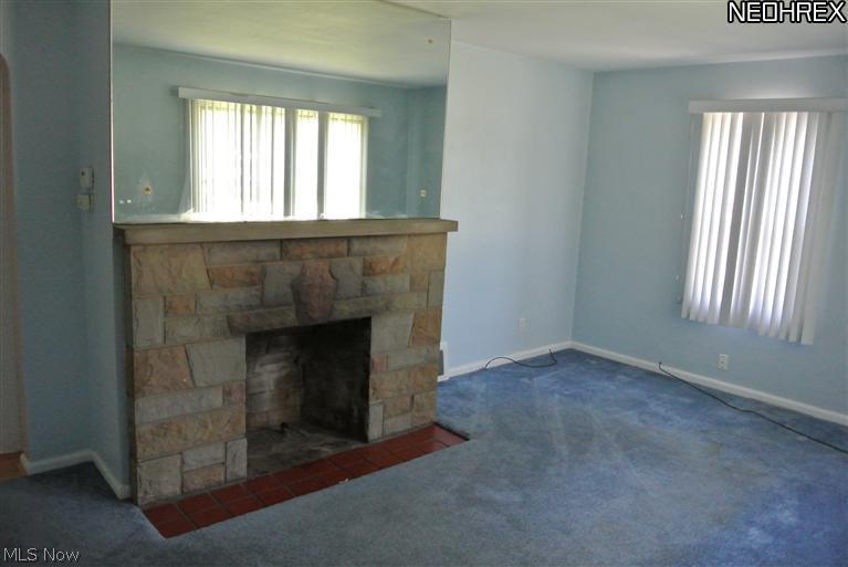 25864 Highland Road Cleveland, OH 44143 - Photo 3 of 8 living room with fireplace
