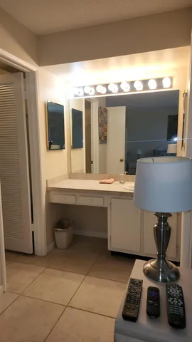 a room with furniture and flat screen tv