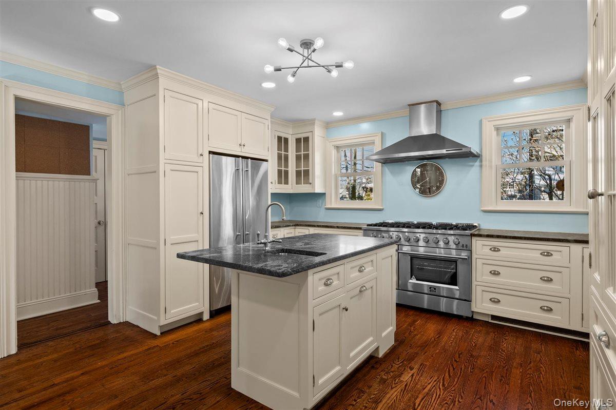 525 Milton Road Rye, NY 10580 - Photo 15 of 42 a kitchen with stainless steel appliances granite countertop a stove and a refrigerator
