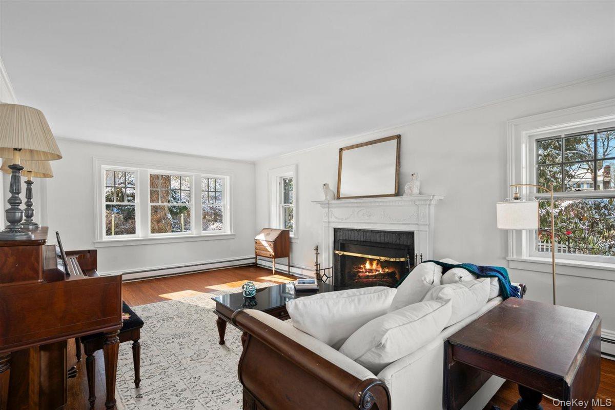 525 Milton Road Rye, NY 10580 - Photo 18 of 42 a living room with furniture fireplace and window