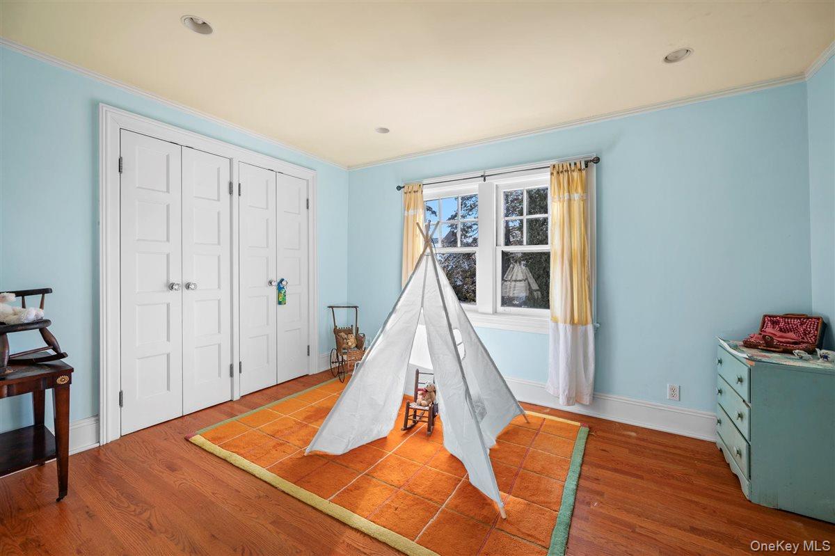 525 Milton Road Rye, NY 10580 - Photo 27 of 42 a view of a room with wooden floor and windows