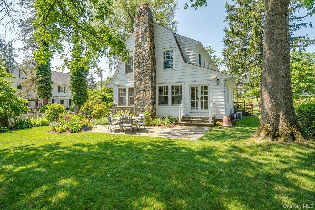 525 Milton Road Rye, NY 10580 - Photo 3 of 42 front view of a house with a yard