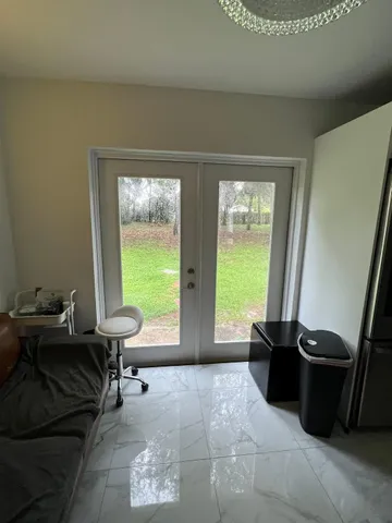 a room with furniture and a window