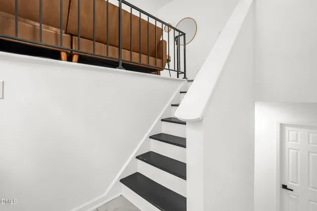 a view of entryway with wooden floor