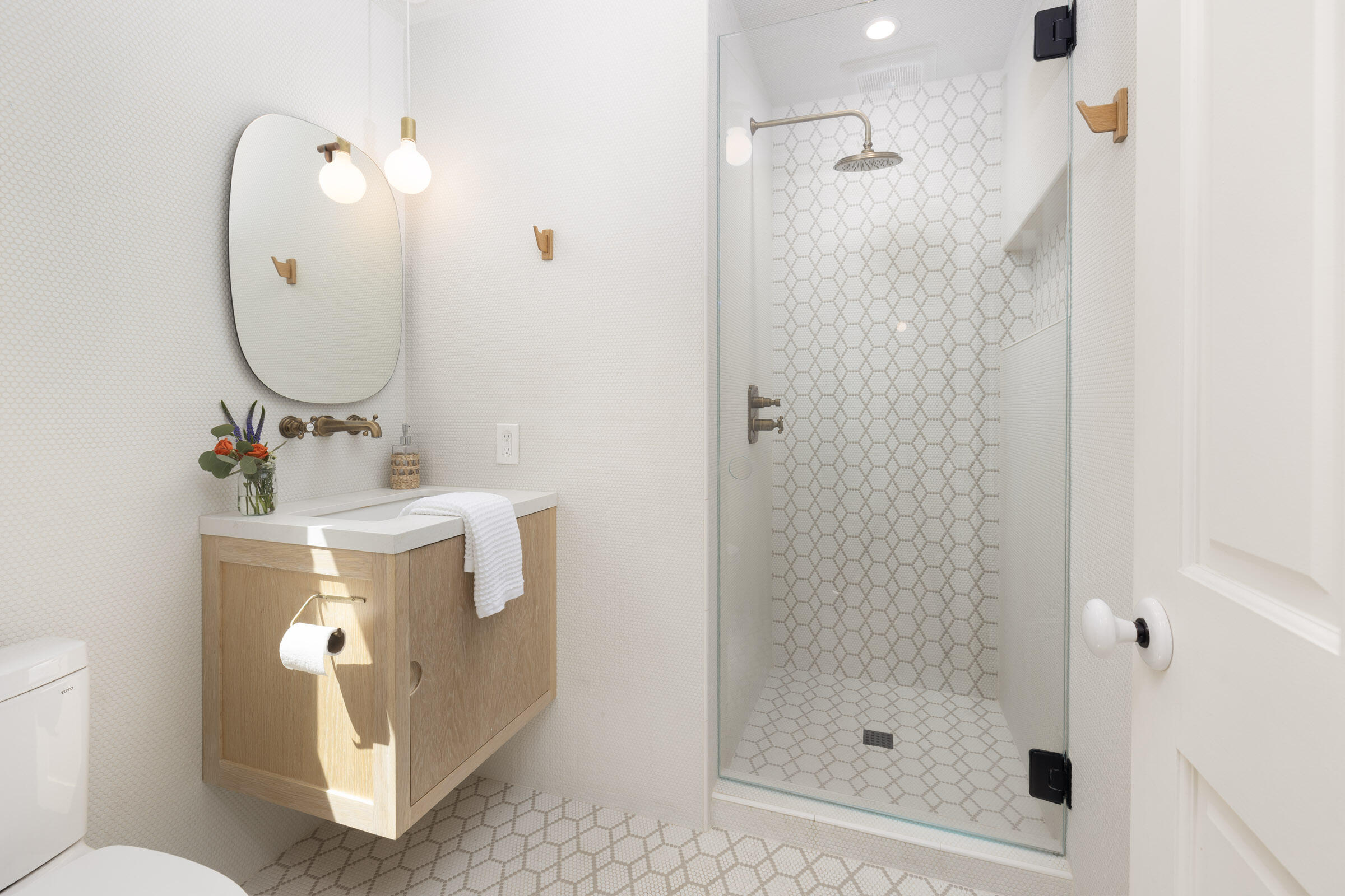 925 Chelham Way Montecito, CA 93108 - Photo 14 of 16 a bathroom with a sink a toilet and shower