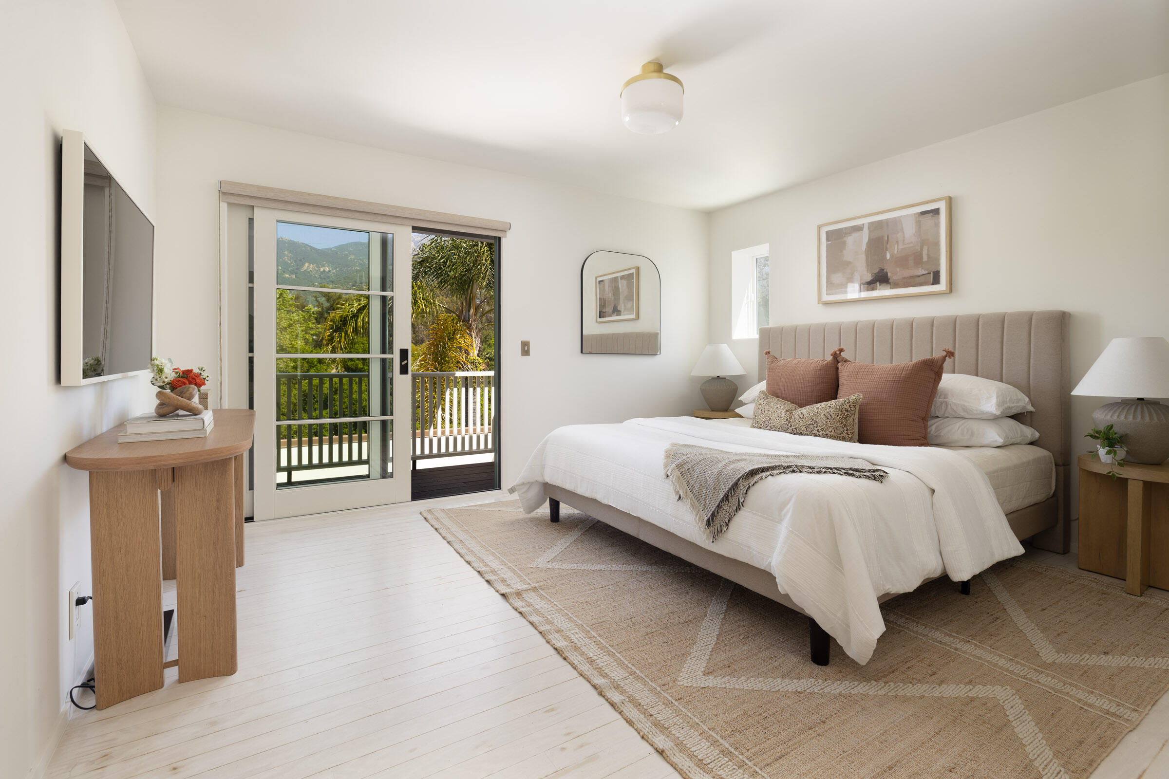 925 Chelham Way Montecito, CA 93108 - Photo 10 of 16 a bedroom with a large bed and a window