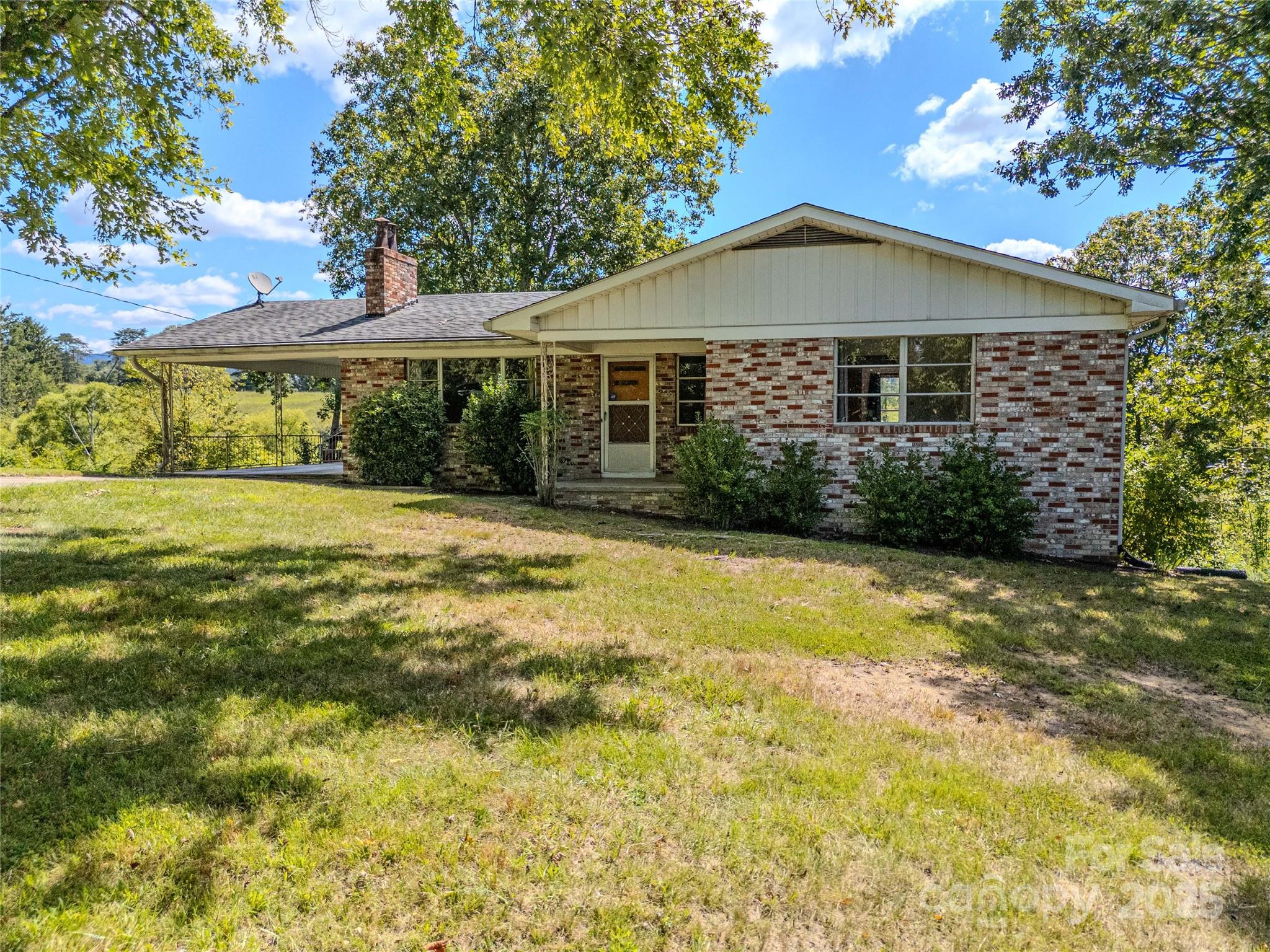 56 Gill Branch Road Weaverville, NC 28787 - Photo 1 of 47 a front view of a house with a yard