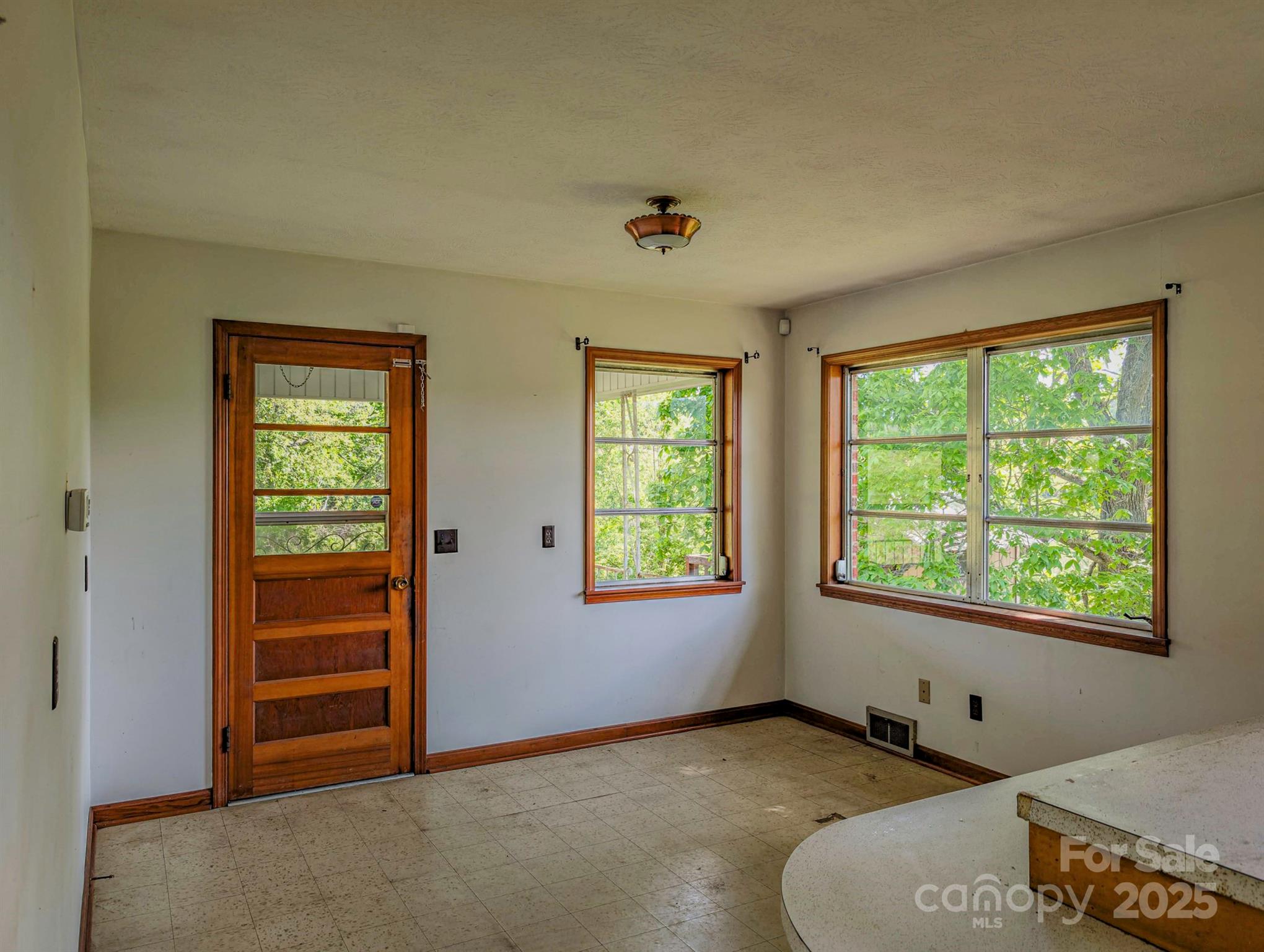 56 Gill Branch Road Weaverville, NC 28787 - Photo 12 of 47 a view of an empty room with a window
