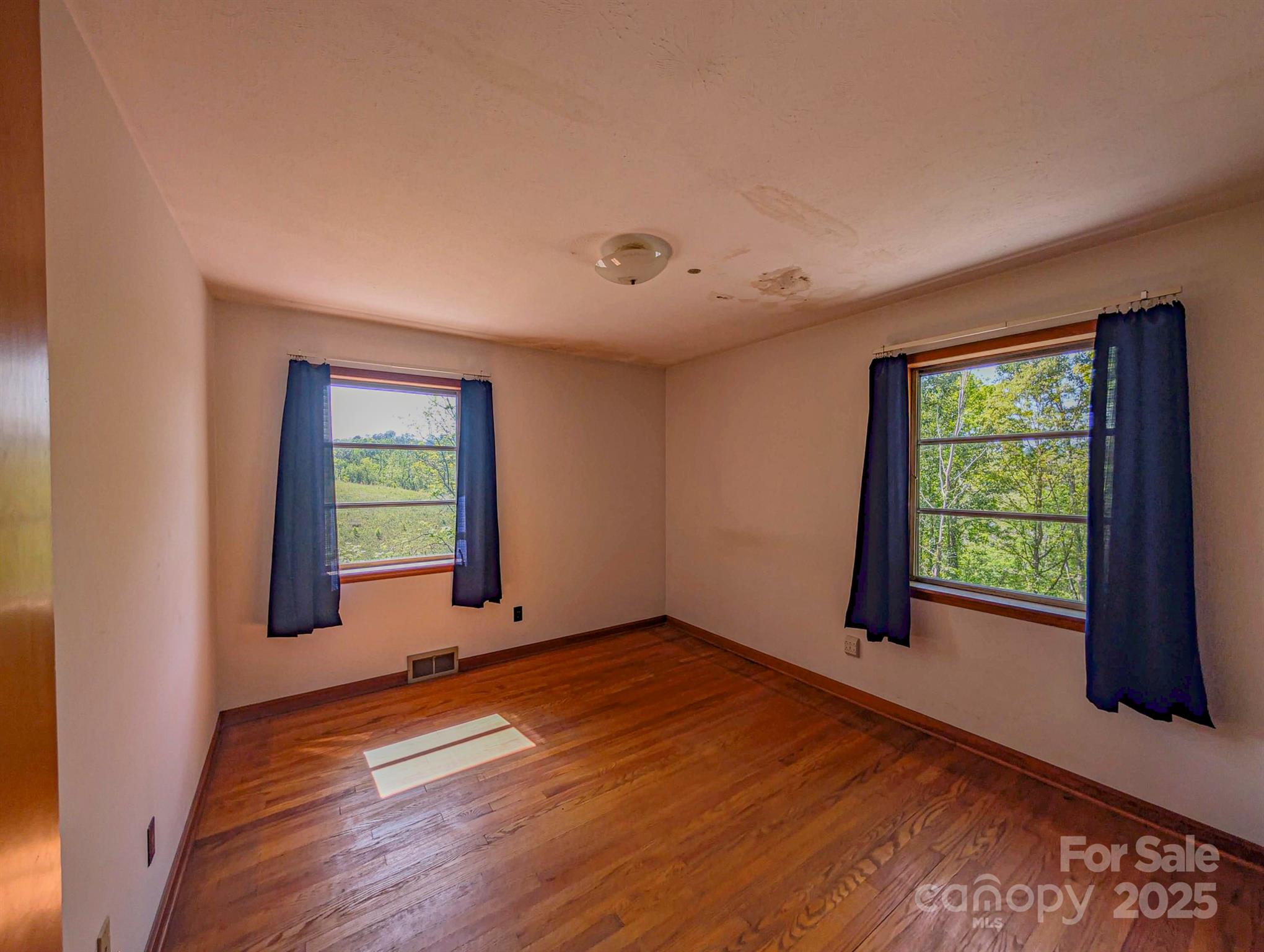 56 Gill Branch Road Weaverville, NC 28787 - Photo 14 of 47 an empty room with windows