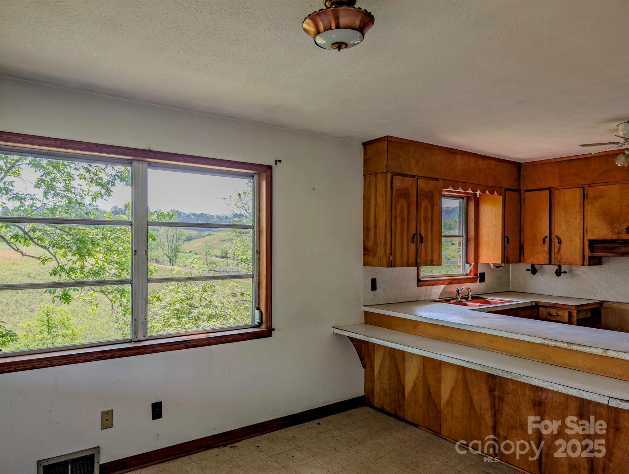 56 Gill Branch Road Weaverville, NC 28787 - Photo 15 of 47 a spacious bathroom with a large window and sink