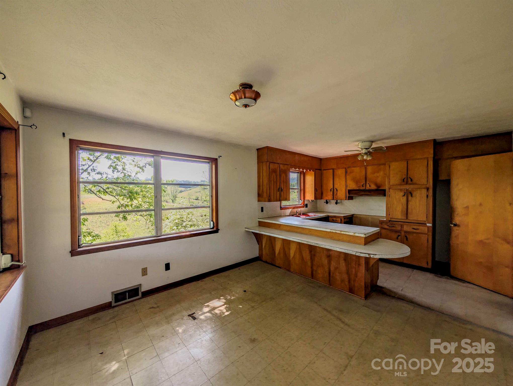 56 Gill Branch Road Weaverville, NC 28787 - Photo 20 of 47 a room with furniture and window