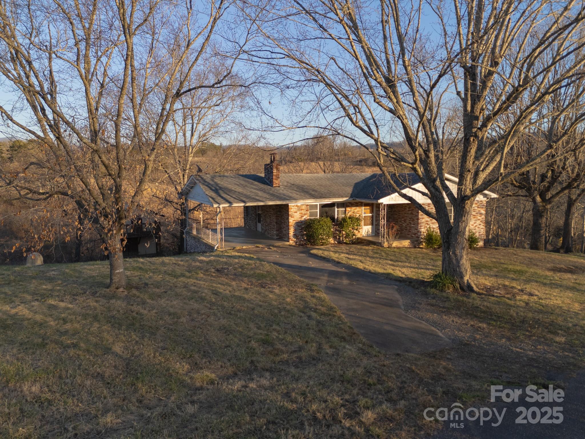 56 Gill Branch Road Weaverville, NC 28787 - Photo 27 of 47 a front view of a house with a yard