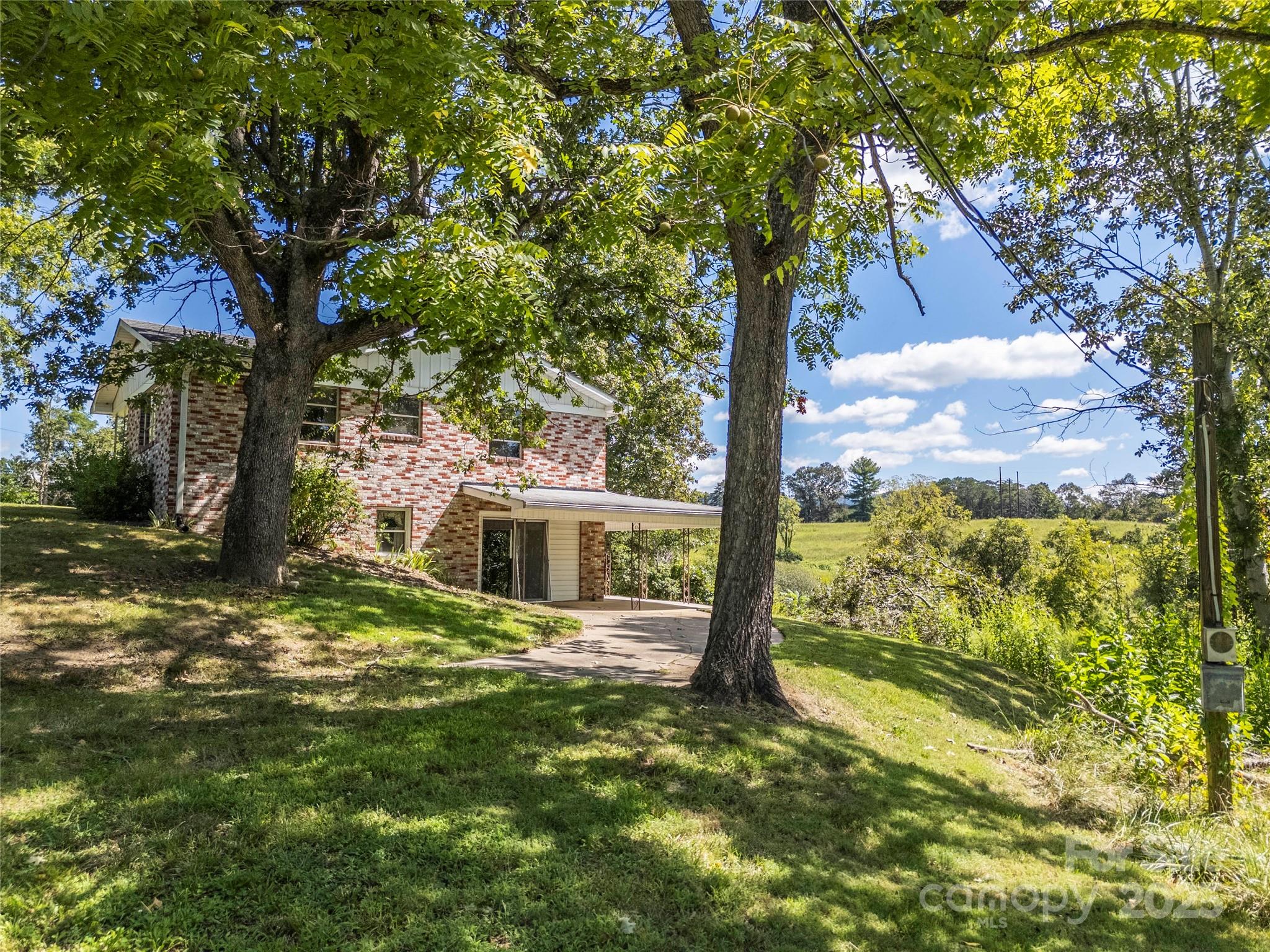 56 Gill Branch Road Weaverville, NC 28787 - Photo 3 of 47 a view of house with backyard