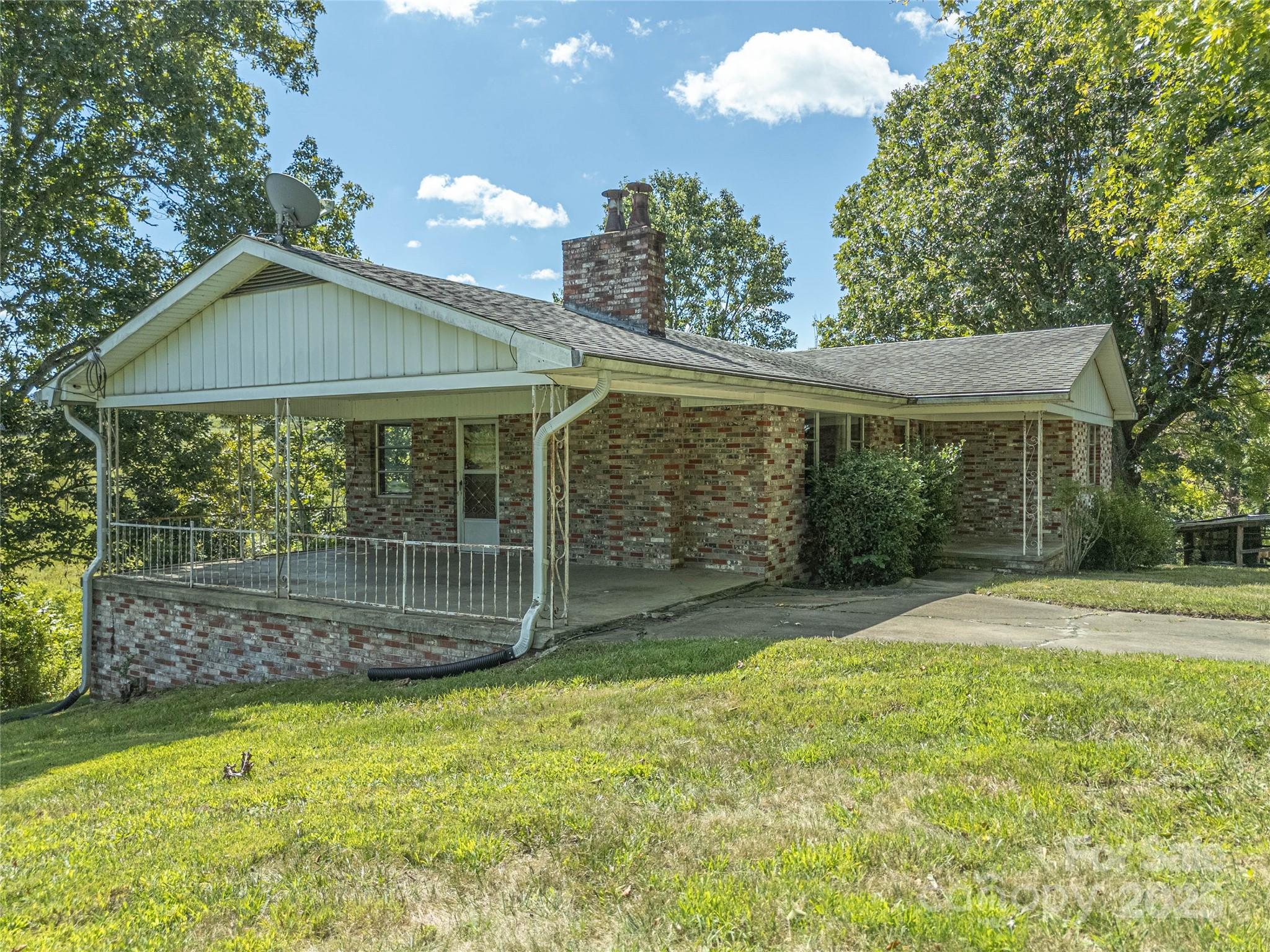 56 Gill Branch Road Weaverville, NC 28787 - Photo 31 of 47 a front view of a house with a garden