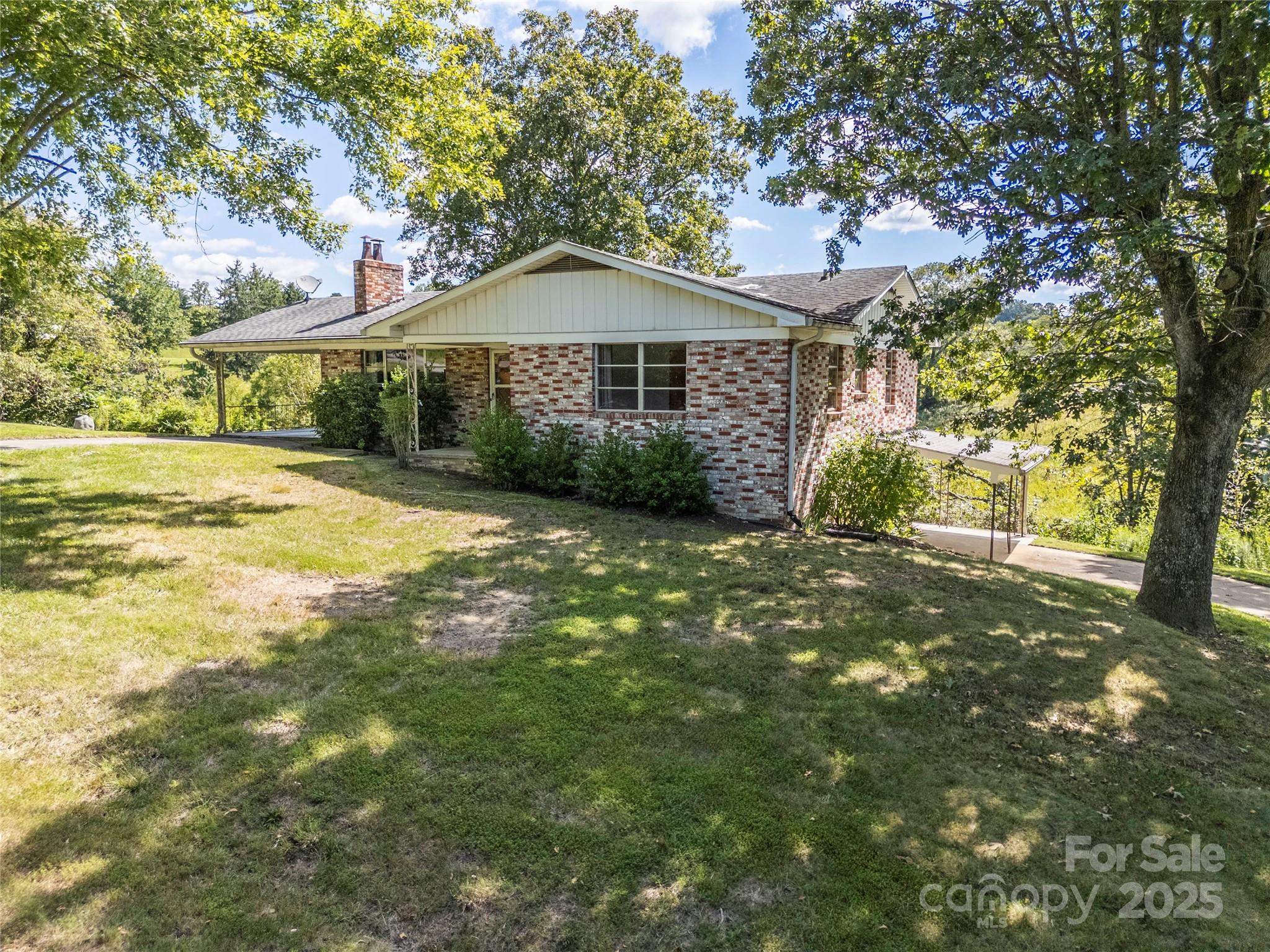 56 Gill Branch Road Weaverville, NC 28787 - Photo 43 of 47 a front view of a house with a yard
