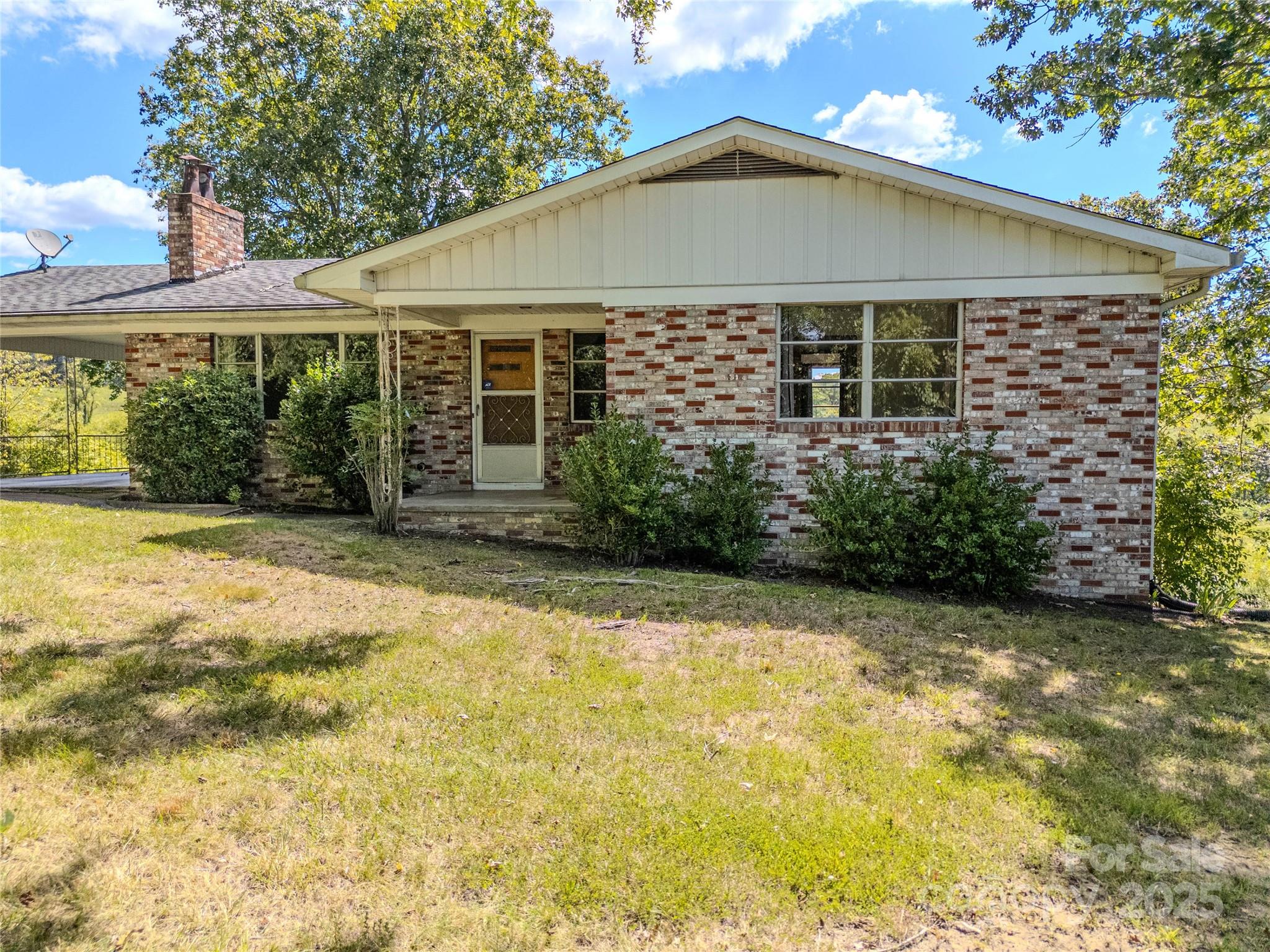 56 Gill Branch Road Weaverville, NC 28787 - Photo 46 of 47 a front view of a house with a yard