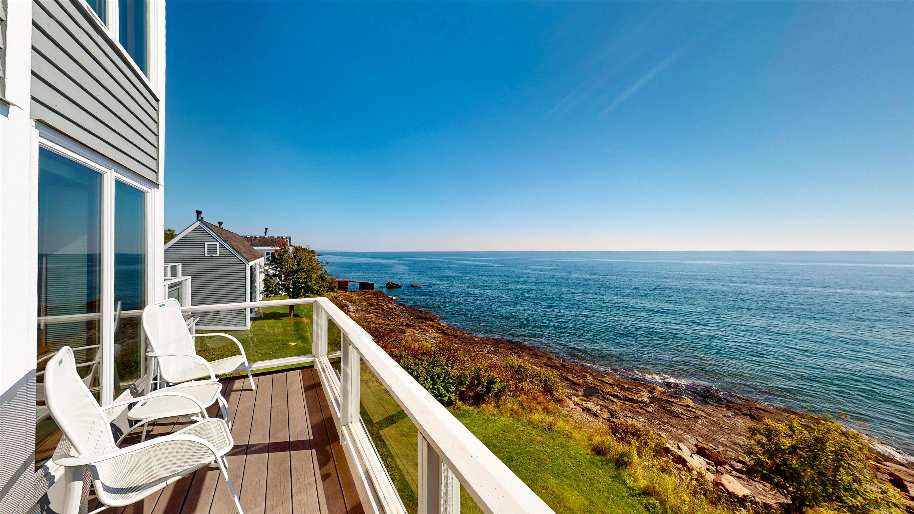 7192 Highway 61, Unit 37 Tofte, MN 55615 - Photo 2 of 15 Balcony featuring a water view