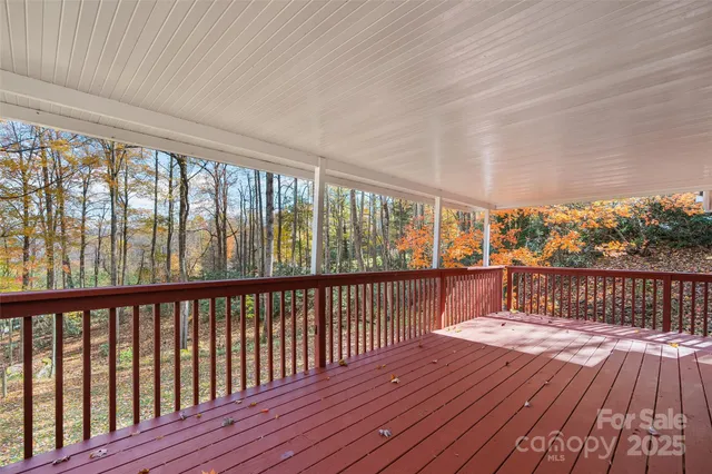 a balcony with wooden floor