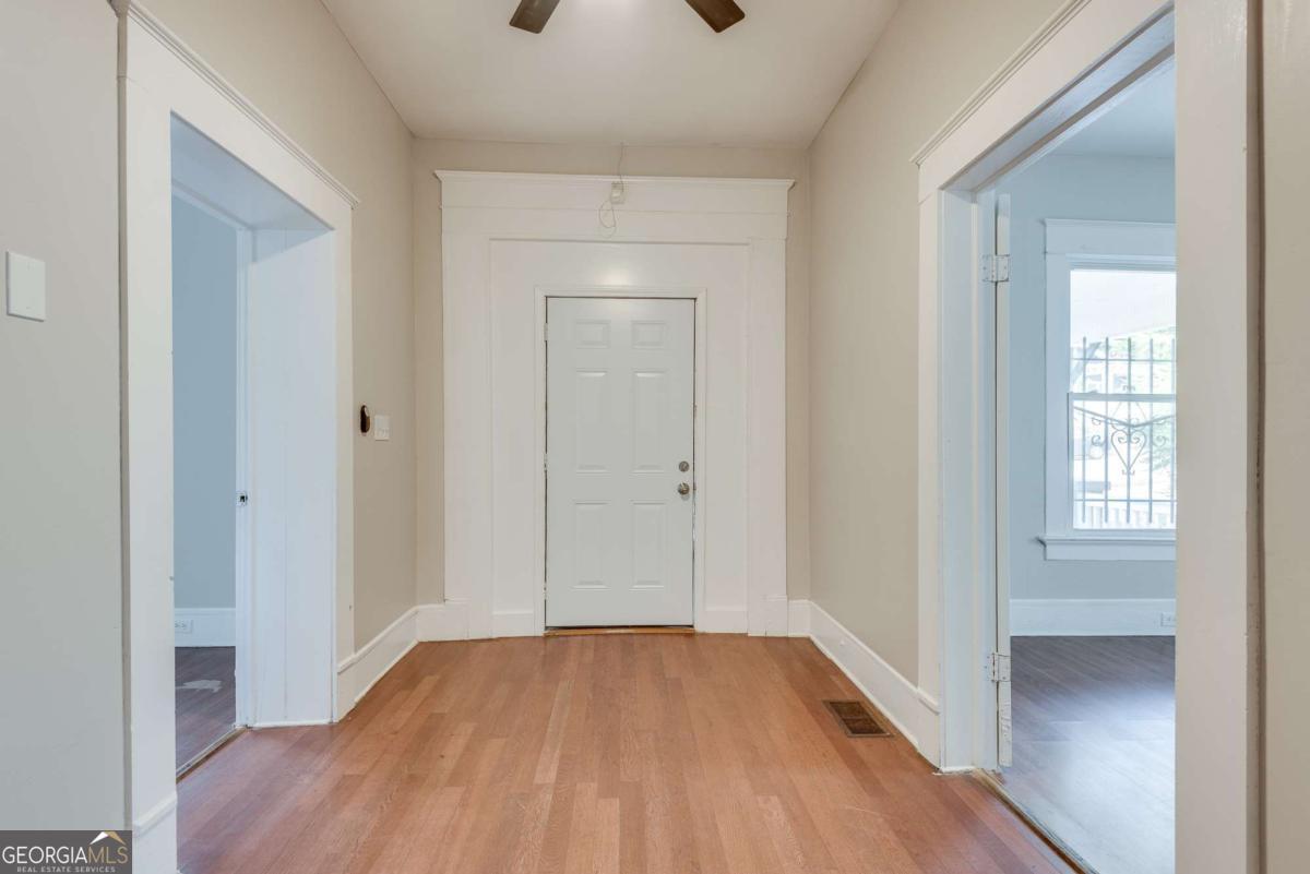 1330 Allene Avenue Southwest Atlanta, GA 30310 - Photo 3 of 24 wooden floor in an empty room with a window