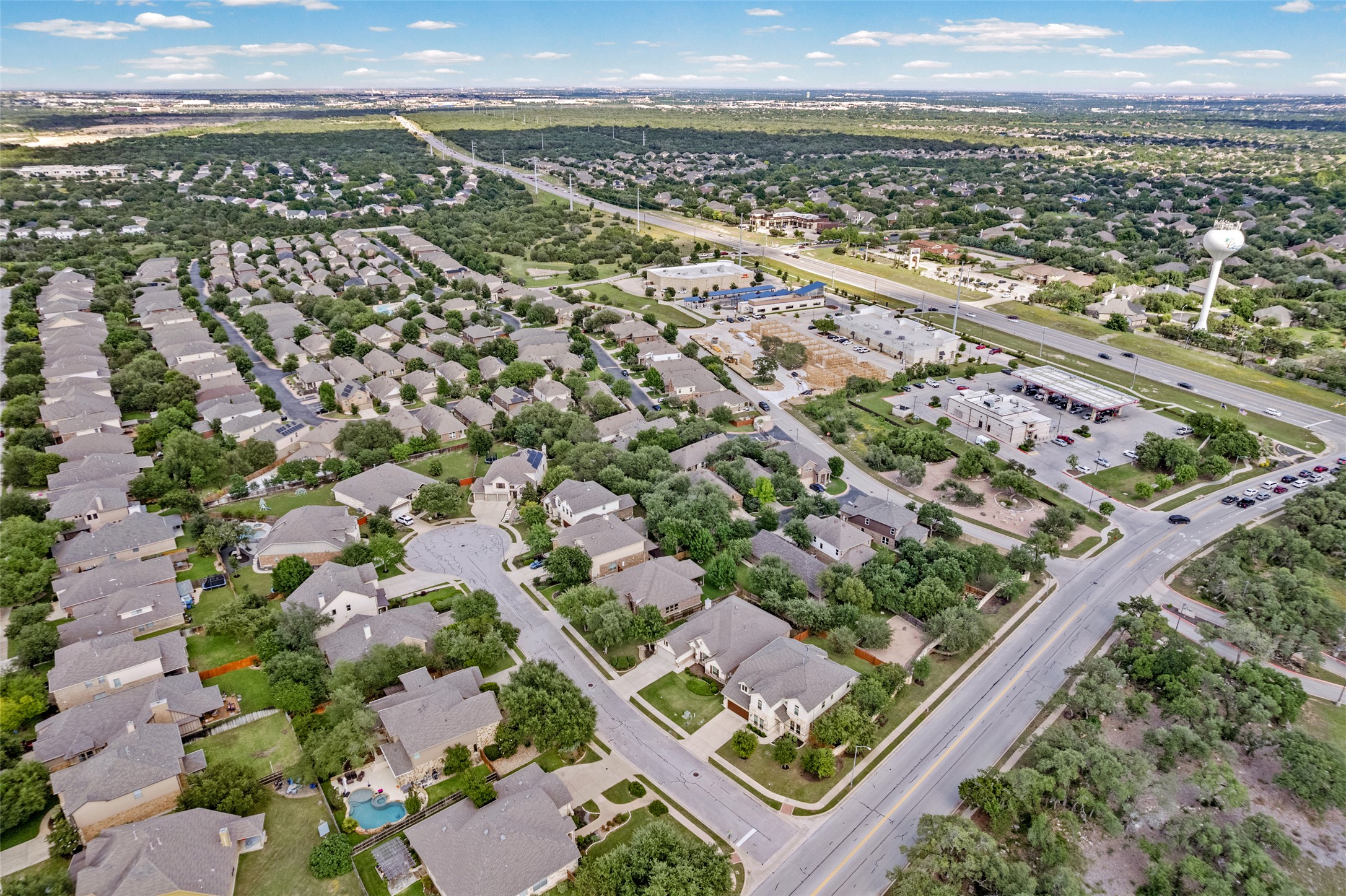 3451 Mayfield Ranch Boulevard, Unit 201 Round Rock, TX 78681 - Photo 26 of 29 an aerial view of residential building and ocean
