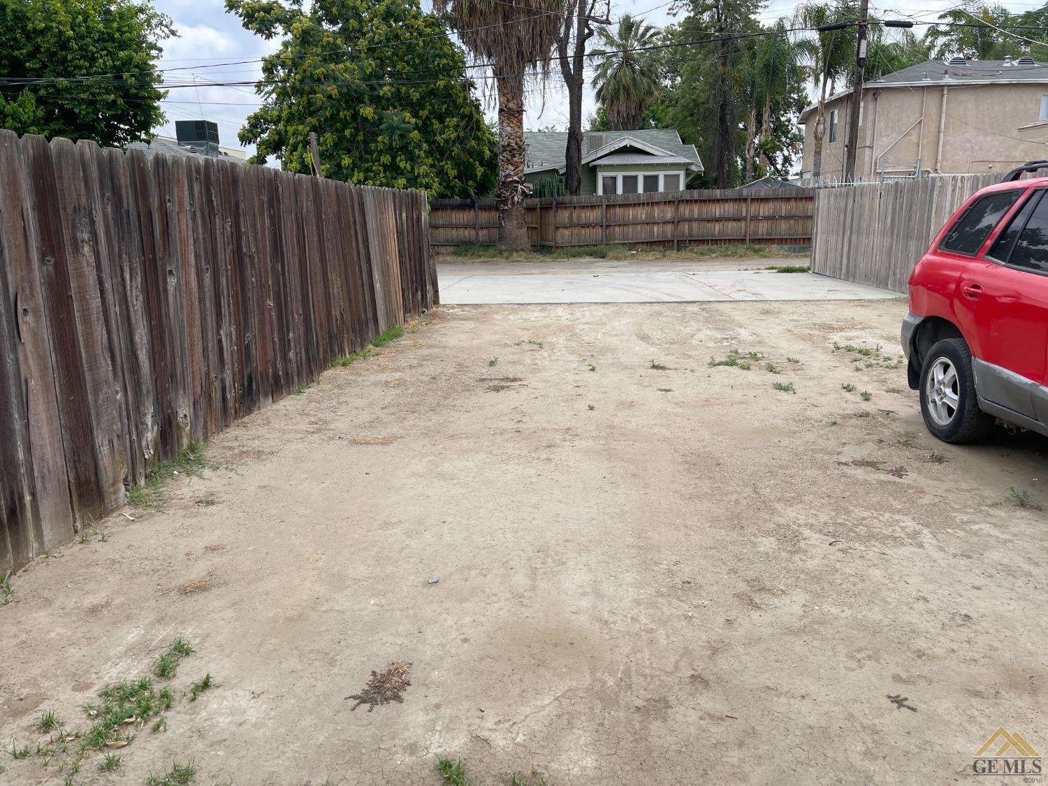 Undisclosed Address Bakersfield, CA 93304 - Photo 6 of 14 a view of street with parked cars