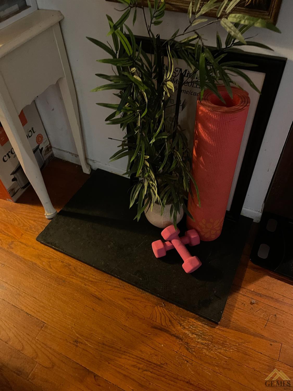 Undisclosed Address Bakersfield, CA 93304 - Photo 9 of 14 a vase of flowers sitting on a table