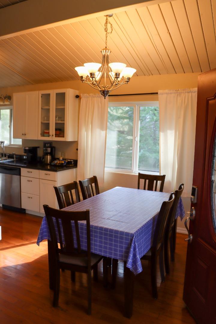 19418 Ferretti Road Groveland, CA 95321 - Photo 8 of 35 a view of a dining room with furniture window and wooden floor