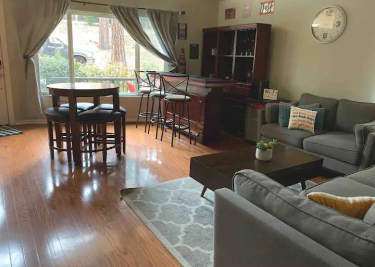 19418 Ferretti Road Groveland, CA 95321 - Photo 9 of 35 a living room with furniture a wooden floor and next to a window