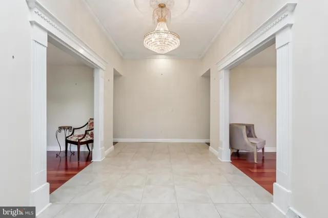 a view of a hallway with seating area