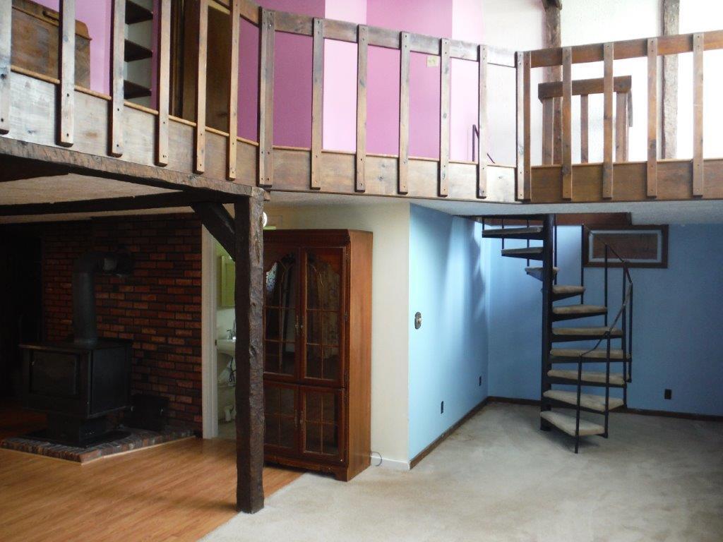 204 Stevenstown Road Litchfield, ME 04350 - Photo 20 of 29 VIEW OF 2ND FLOOR RAILING FROM LR