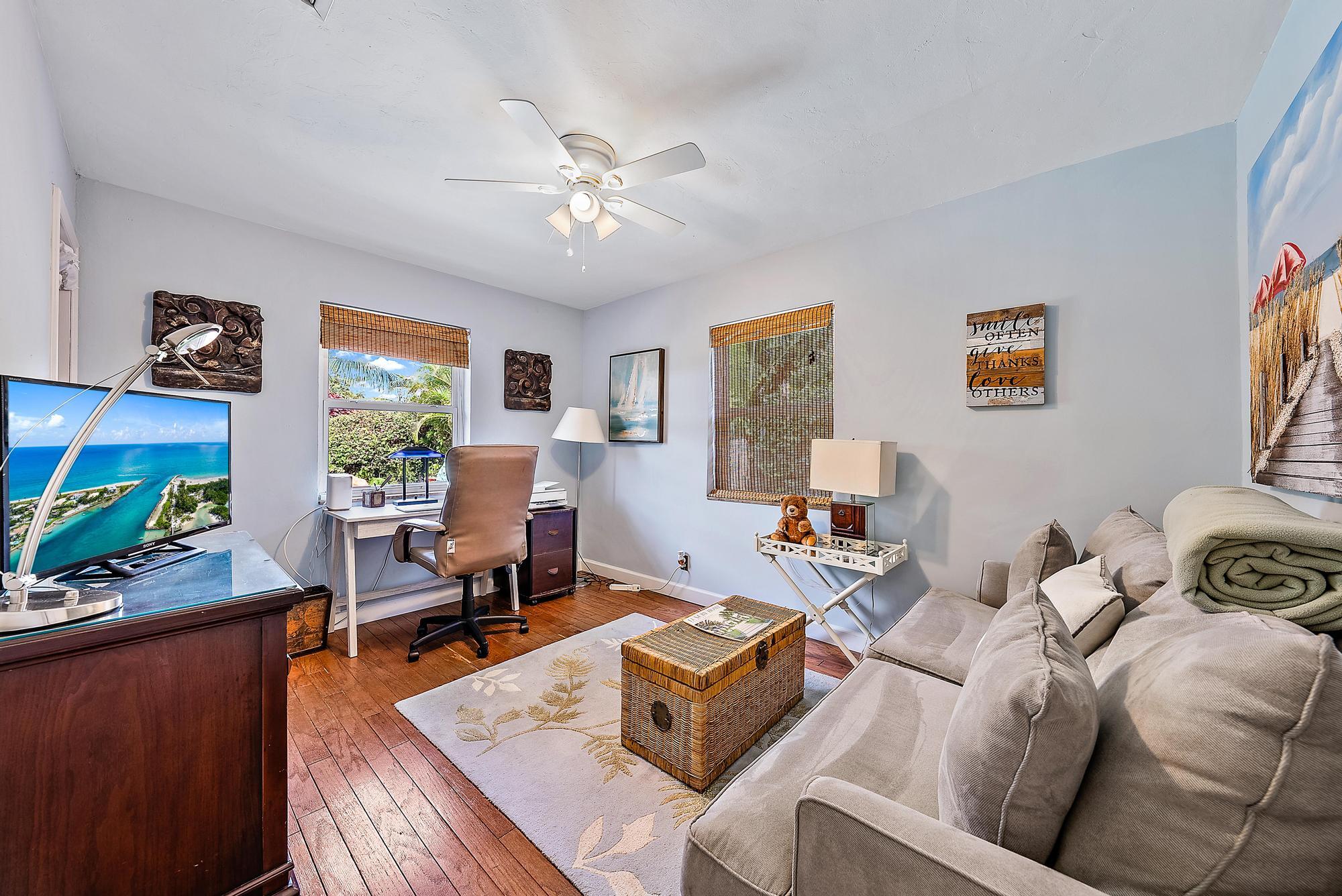245 Arlington Road West Palm Beach, FL 33405 - Photo 12 of 40 a living room with furniture and a window