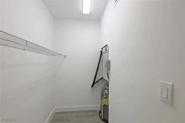 a white bath tub sitting next to a white sink