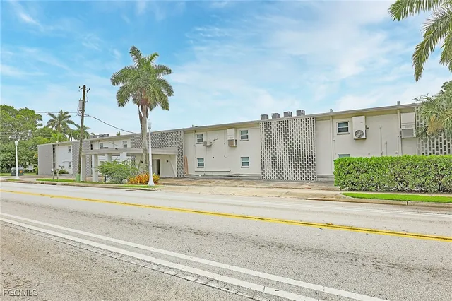 a view of a building with a road