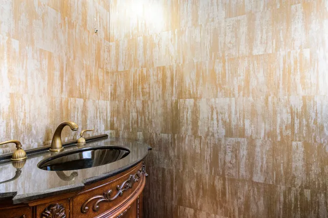 a bathroom with a sink a mirror and a shower curtain