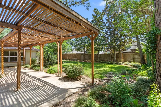 a view of backyard with green space