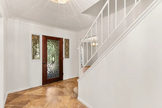 a view of entryway with stairs