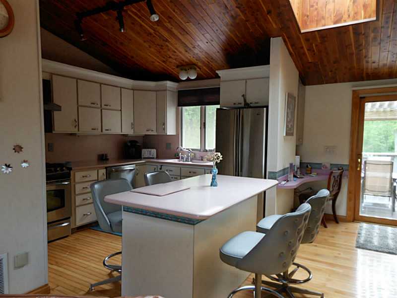 161 Pippin Orchard Road Cranston, RI 02921 - Photo 6 of 25 Kitchen. Stainless, tiled kitchen overlooking formal dining & great room